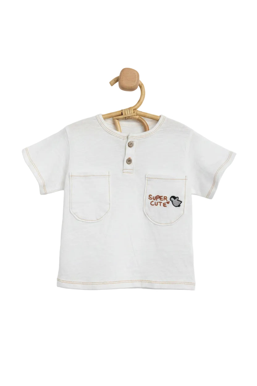 Children's t-shirt with 'Super Cute' text on a hanger against a gray background